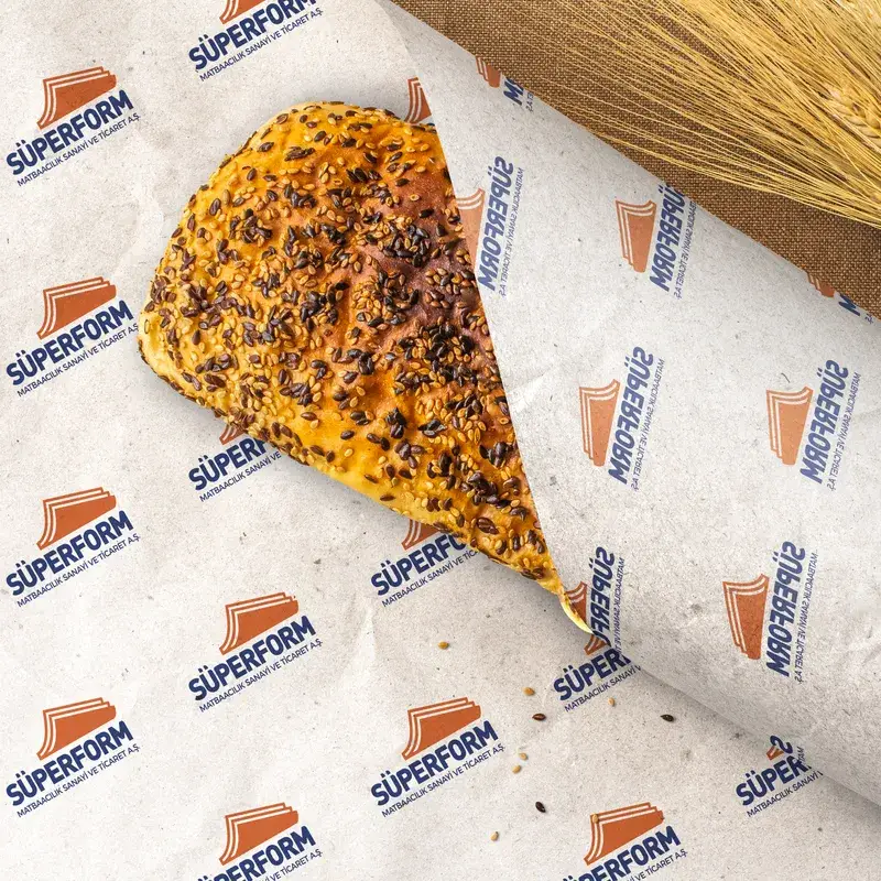 Çörek otlu ekmek sarılmış logo baskılı sülfit kâğıt